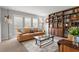 Cozy living room features stylish shelving and comfortable seating at 14542 Anchorage Cir, Seminole, FL 33776