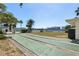 Community shuffleboard courts for a leisurely pastime with waterfront view at 14542 Anchorage Cir, Seminole, FL 33776