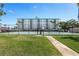 Tennis courts for active recreation with building view and convenient access at 14542 Anchorage Cir, Seminole, FL 33776