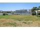 Community volleyball court offers active recreation with scenic backdrop at 14542 Anchorage Cir, Seminole, FL 33776