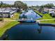 Scenic aerial view of the community, showing waterways, landscaping, and peaceful setting at 149 Sky Loch Dr E, Dunedin, FL 34698