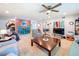Large living room featuring stylish decor and ample space for activities and entertaining at 149 Sky Loch Dr E, Dunedin, FL 34698