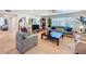 Comfortable living room with a large window and space for entertaining at 149 Sky Loch Dr E, Dunedin, FL 34698