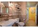 Well-appointed bathroom with stone accents and a shower at 1910 E Palm Ave # 10209, Tampa, FL 33605