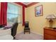 Bright bedroom area featuring a work desk, natural light, and comfortable chair at 1910 E Palm Ave # 10209, Tampa, FL 33605