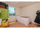Bright bedroom featuring wood floors and lots of natural light at 1910 E Palm Ave # 10209, Tampa, FL 33605