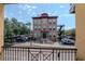 Exterior view of a well-maintained building with brick facade and landscaping at 1910 E Palm Ave # 10209, Tampa, FL 33605