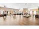 Spacious clubhouse featuring a pool table, seating areas, and abundant natural light for community enjoyment at 1910 E Palm Ave # 10209, Tampa, FL 33605