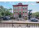 A stunning brick building with an external staircase and beautiful window views, offering a peek into urban living at 1910 E Palm Ave # 10209, Tampa, FL 33605