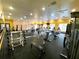 Bright and airy community gym with various workout machines and floor to ceiling mirrors for resident use at 1910 E Palm Ave # 10209, Tampa, FL 33605