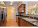 Modern kitchen with hardwood floors, stainless steel appliances and open layout at 1910 E Palm Ave # 10209, Tampa, FL 33605