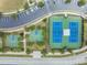 Aerial shot featuring the basketball and tennis courts in the community at 19400 Roseate Dr, Lutz, FL 33558