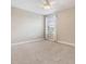 Bedroom featuring neutral walls, carpet and light filled window with curtains and blinds at 19400 Roseate Dr, Lutz, FL 33558