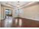 Bright living room with sliding glass doors to the patio and plenty of natural light at 19400 Roseate Dr, Lutz, FL 33558