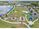 Aerial view of the playground with swings, slides, and picnic areas at 19400 Roseate Dr, Lutz, FL 33558