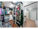 Walk-in closet with custom storage and shelving with the bathroom visible at 2303 S Occident St, Tampa, FL 33629