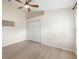 Bright bedroom boasts a ceiling fan, closet, neutral walls, and a window with plantation shutters at 2402 Blue Stone Ct, Valrico, FL 33594