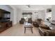 Open-concept living room with comfortable seating and lots of natural light at 2402 Blue Stone Ct, Valrico, FL 33594