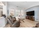 Open concept with living room in view of the dining and kitchen at 2402 Blue Stone Ct, Valrico, FL 33594