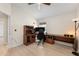 Home office featuring built in desk, natural light, and hardwood floors at 2402 Blue Stone Ct, Valrico, FL 33594