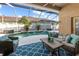 Relaxing outdoor living space features a covered patio and screened pool at 2402 Blue Stone Ct, Valrico, FL 33594