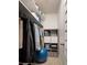 Walk-in closet provides shelving, rod, and cubbies for organized storage space at 2487 W Bay Isle Se Dr, St Petersburg, FL 33705