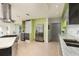 Contemporary kitchen with a central island, stainless steel appliances, and ample storage space at 2487 W Bay Isle Se Dr, St Petersburg, FL 33705