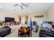 An expansive bonus room is a paradise, with a TV, seating, wet bar, and a plethora of toys at 2653 Longleaf Pine Pt, New Port Richey, FL 34655