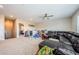 Large bonus room boasts a wet bar, comfortable seating, and is filled with toys and activities for  at 2653 Longleaf Pine Pt, New Port Richey, FL 34655