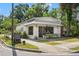Quaint storefront with eye-catching signage, complemented by a charming outdoor seating area, offering a welcoming ambiance at 3008 N 13Th St, Tampa, FL 33605