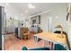Open-concept kitchen with a view into the dining area, featuring granite counters and stainless appliances at 3008 N 13Th St, Tampa, FL 33605