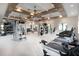 Well-equipped gym featuring treadmills, weight machines, and ample space for a comprehensive workout routine at 31826 Griffin Sands Ln, San Antonio, FL 33576