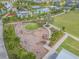 Aerial shot featuring community pool, playground, and recreation amenities, providing a variety of options for residents at 3303 Monroe Meadows Dr, Odessa, FL 33556
