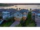 Charming two-story home with a well-maintained lawn, inviting curb appeal, and an attached two car garage at 3303 Monroe Meadows Dr, Odessa, FL 33556