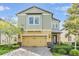 Charming two-story home showcasing well-manicured landscaping and a welcoming facade at 3303 Monroe Meadows Dr, Odessa, FL 33556