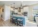 Well-designed kitchen with granite countertops, stainless steel appliances, and ample cabinet space at 3303 Monroe Meadows Dr, Odessa, FL 33556