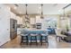 Beautiful kitchen featuring stainless steel appliances, sleek countertops, and a cozy breakfast bar at 3303 Monroe Meadows Dr, Odessa, FL 33556