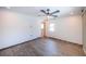 Bright bedroom with wood-look floors and plenty of natural light streaming through a large window at 333 Belleair Ne Dr, St Petersburg, FL 33704