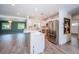 Bright, updated kitchen and living area with stainless steel appliances, white cabinets, and modern finishes at 333 Belleair Ne Dr, St Petersburg, FL 33704