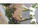 Aerial view of a modern home with a large backyard and neighborhood curb appeal at 36398 Spanish Rose Dr, Dade City, FL 33525