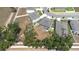 This aerial view shows a neighborhood with modern homes with spacious backyards and manicured lawns at 36398 Spanish Rose Dr, Dade City, FL 33525