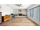 Spacious living room with sleek flooring, modern fireplace and large window is perfect for relaxation at 36601 Roberts Rd, Dade City, FL 33525