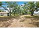 Expansive lot with mature trees offering shade and privacy around the residence at 36601 Roberts Rd, Dade City, FL 33525