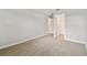 Bedroom with neutral carpet leading into the walk-in closet at 38190 Shale Stone Ct, Zephyrhills, FL 33540