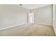 Bright, spacious bedroom with light-colored walls and soft carpet at 38190 Shale Stone Ct, Zephyrhills, FL 33540