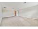 Spacious bonus room showcasing neutral carpet, light-colored walls, and ample space at 38190 Shale Stone Ct, Zephyrhills, FL 33540