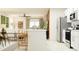 Open-concept kitchen with a breakfast bar that connects to the living area, creating a social hub at 4033 Northern Key Dr, Plant City, FL 33563