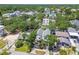 An aerial view of a neighborhood with mature trees, showcasing the property's location and surrounding community at 411 W Frances Ave # 2, Tampa, FL 33602