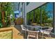 Backyard deck with outdoor seating near modern home with lush plants at 411 W Frances Ave # 2, Tampa, FL 33602