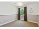 Cozy bedroom with neutral color palette, carpet, and window with curtains at 411 W Frances Ave # 2, Tampa, FL 33602